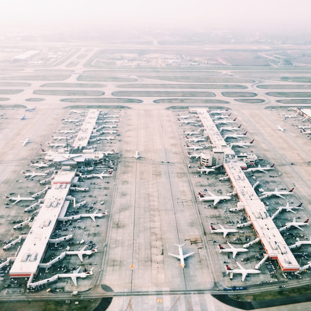 Aerial view of airport terminal in haze